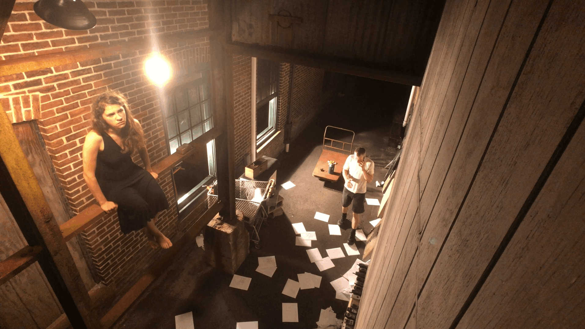 Phone calls in an alley.